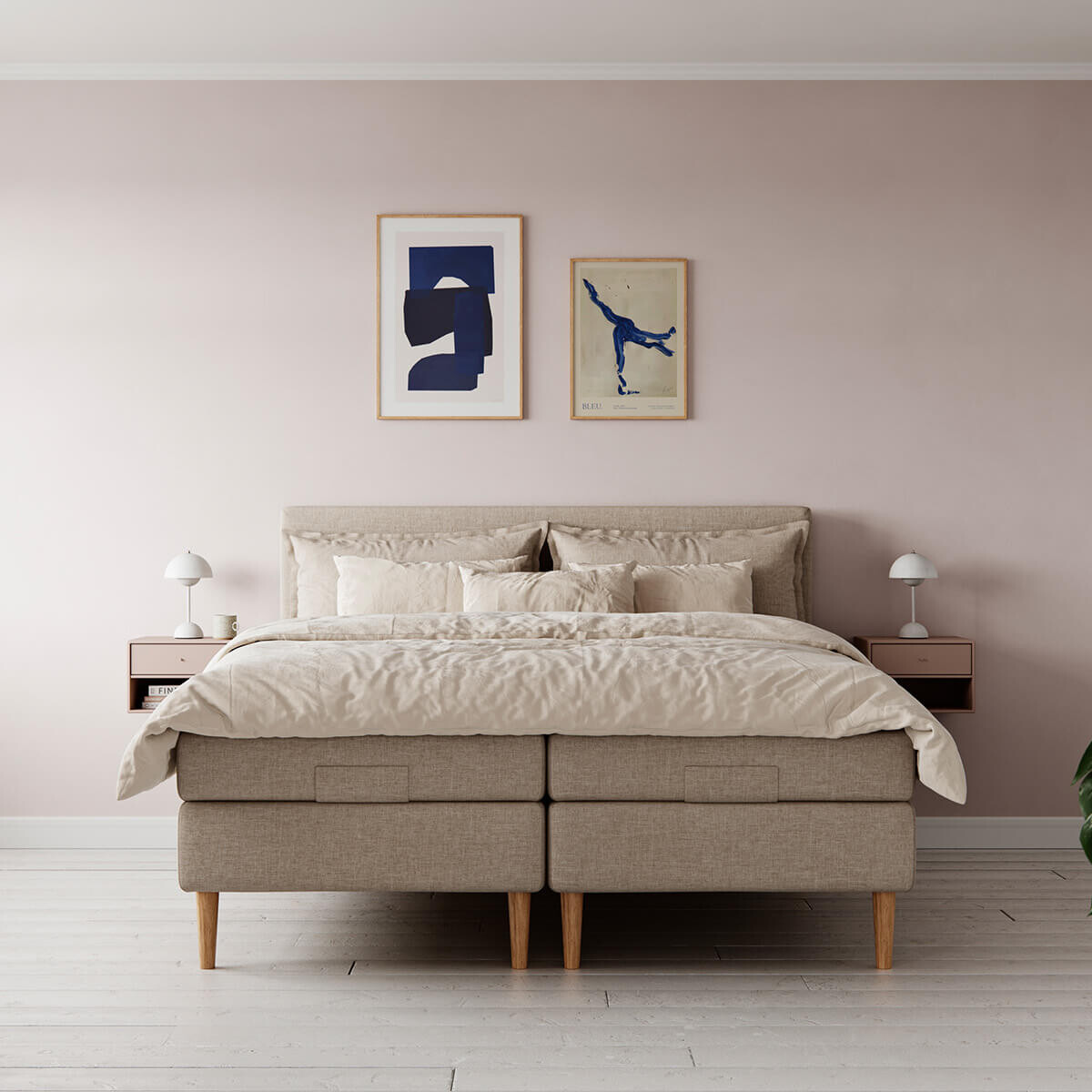 Bedre Nætter Venus elevationsseng i et moderne soveværelse, med elegant design og justerbar funktion, komplet med blødt sengetøj og puder.